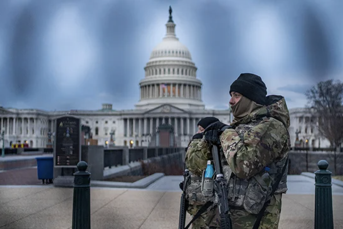 Members of the U.S. National Guard stand in front of the U.S. Capitol. (United Press International)