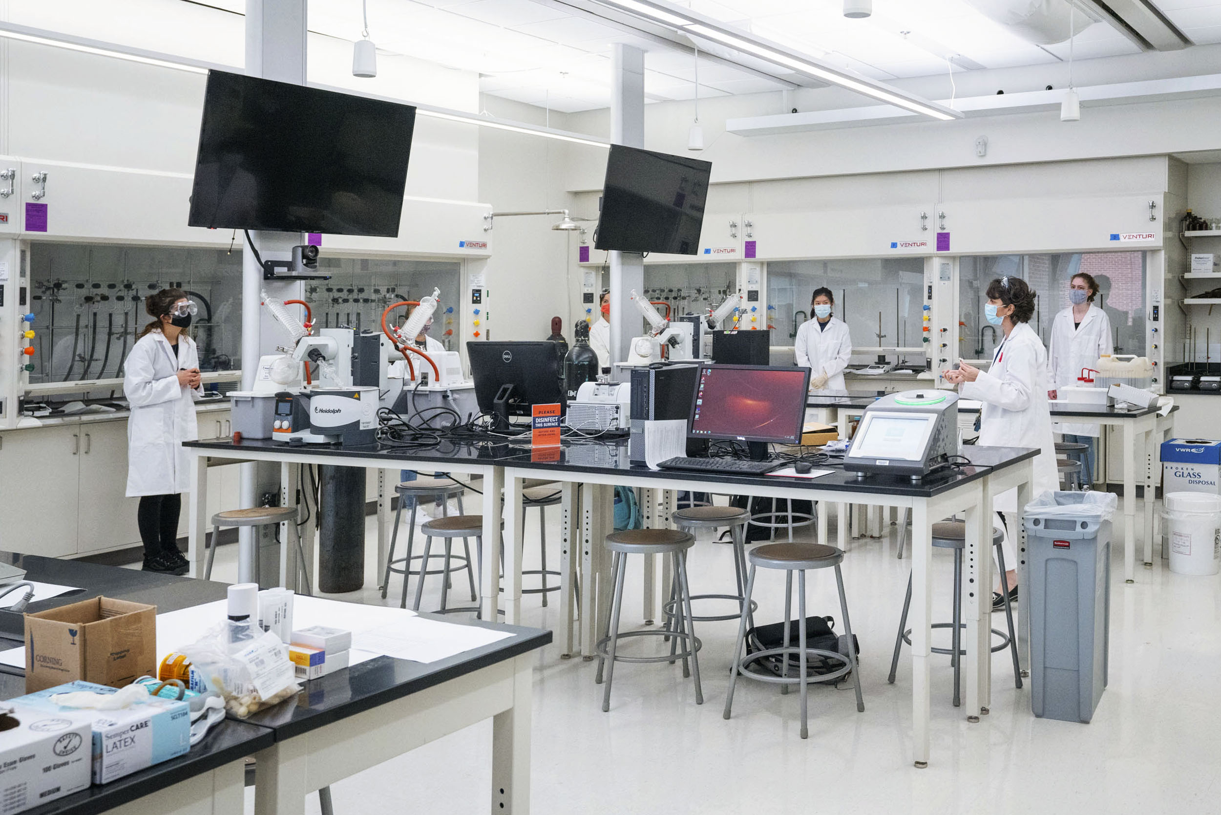 Many lab classes are offered in person in some way, as they are difficult to teach online. Chemistry professor Laura Serbulea arranged her labs to ensure proper distancing. Students stay at their stations until called forward to use equipment.
