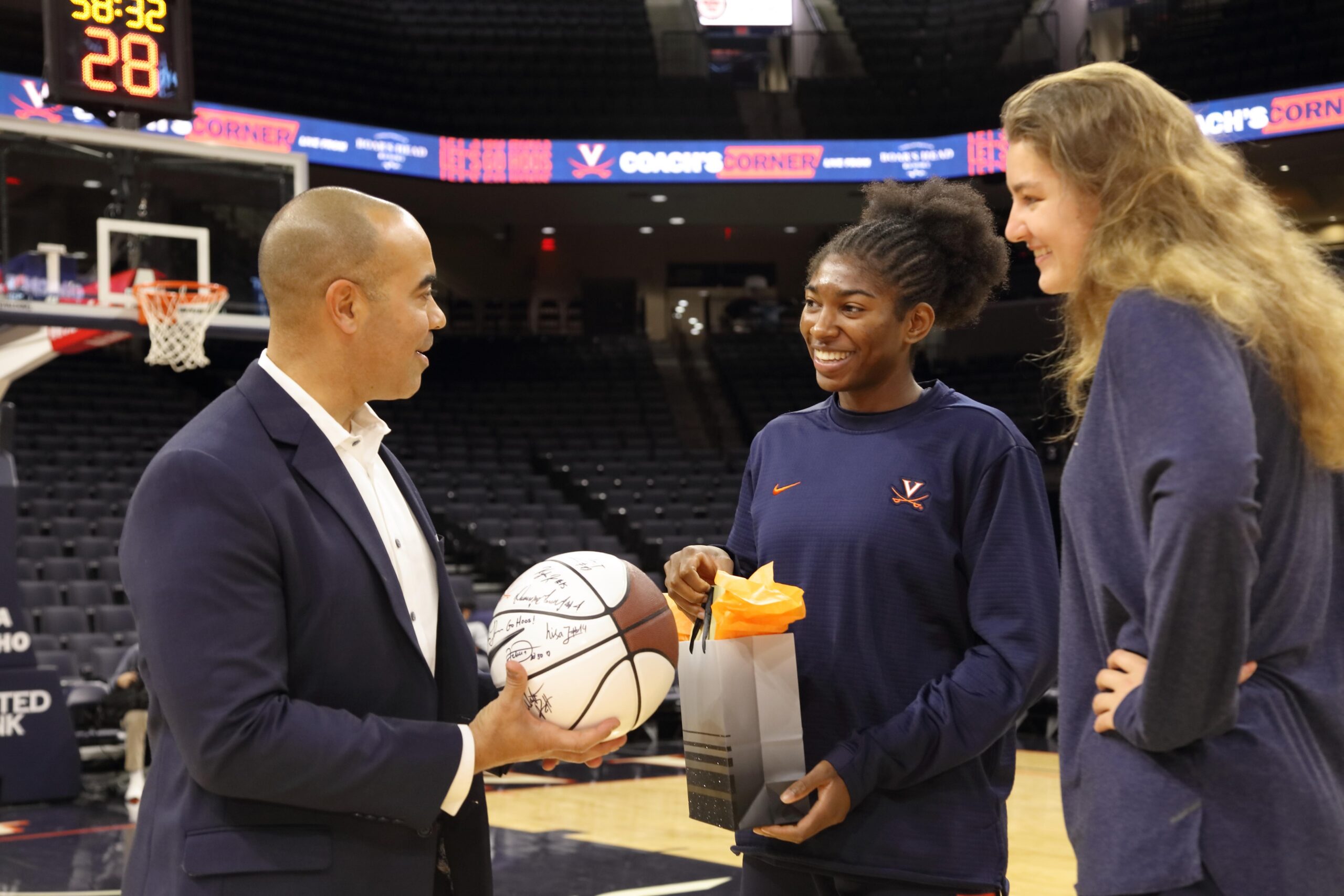 Dean Solomon coaches the women's basketball team.