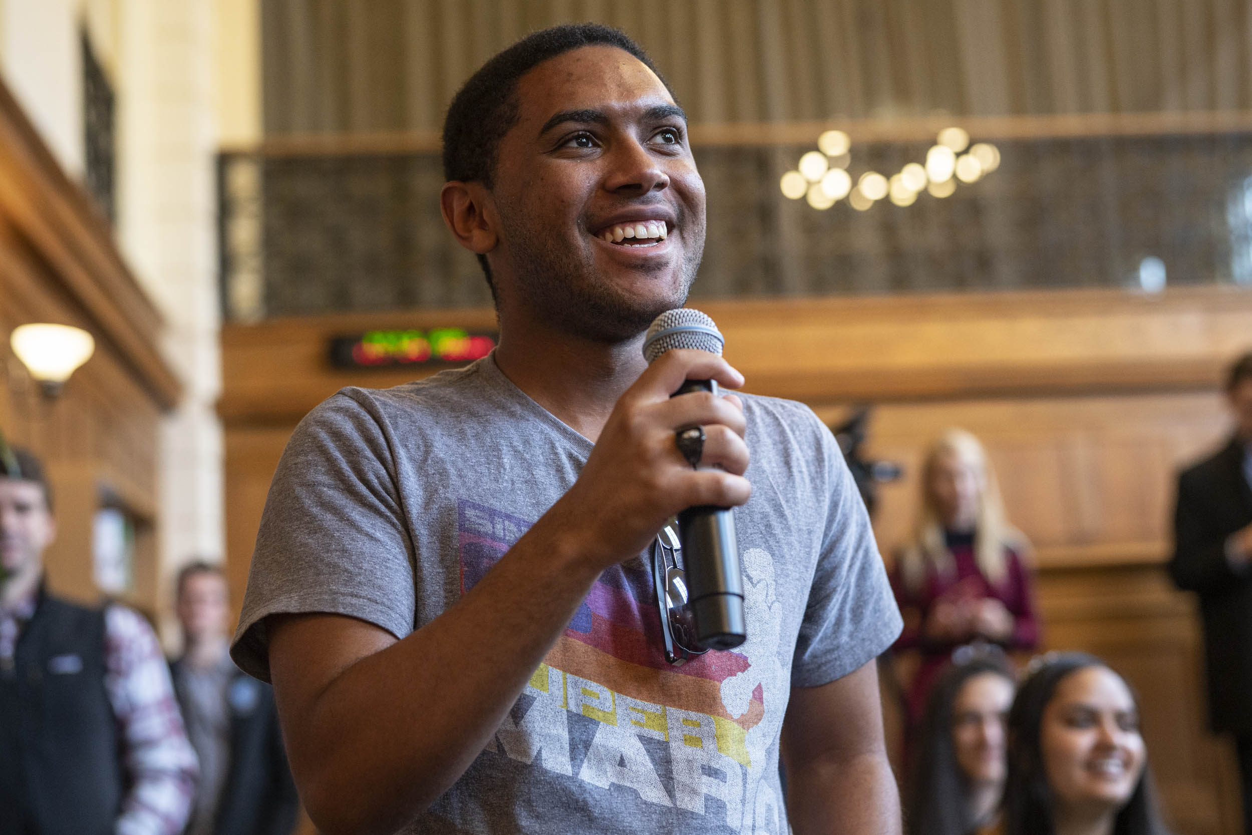 Second-year student Kiwi Kiwinda told Kaine about his father’s military service in the Middle East and asked about the possibility of war with Iran. (Photo by Sanjay Suchak, University Communications)
