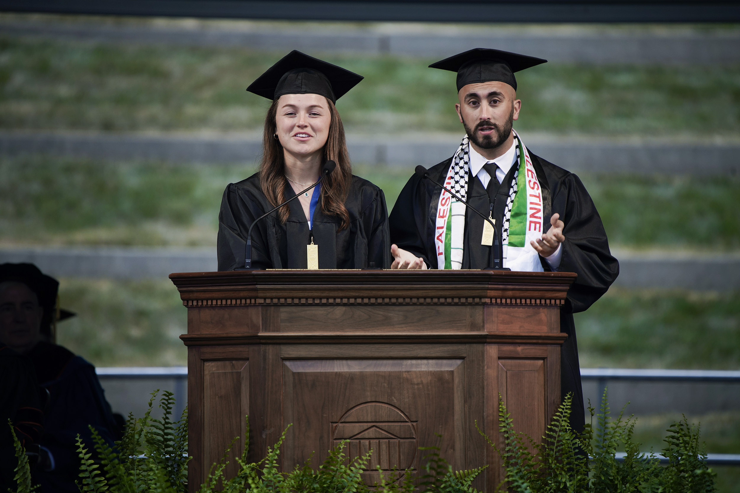 Class of 2020 President Omar Elhaj, right, and Vice President Ginny Brooks took the class on a tour of the last year – things they missed, things they learned, things they questioned. (Photo by Sanjay Suchak, University Communications)